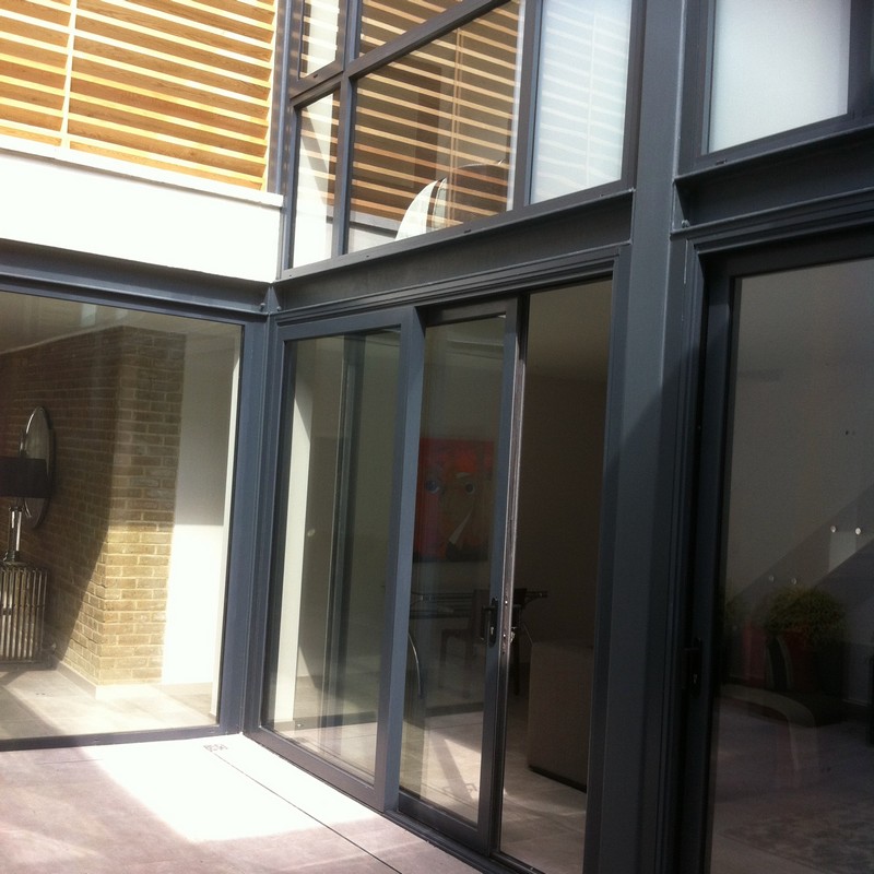 Anthracite aluminium sliding patio doors fitted in Barnes