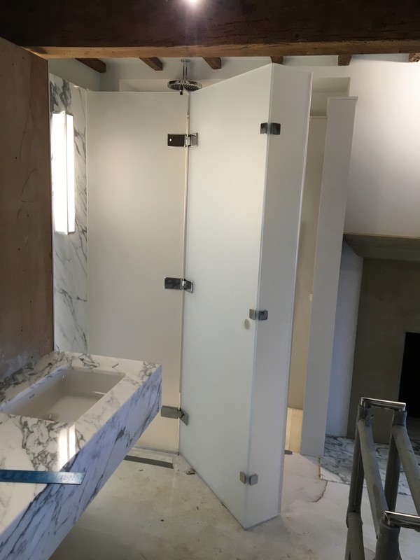 Bespoke frosted glass shower enclosure in Barnes luxury bathroom